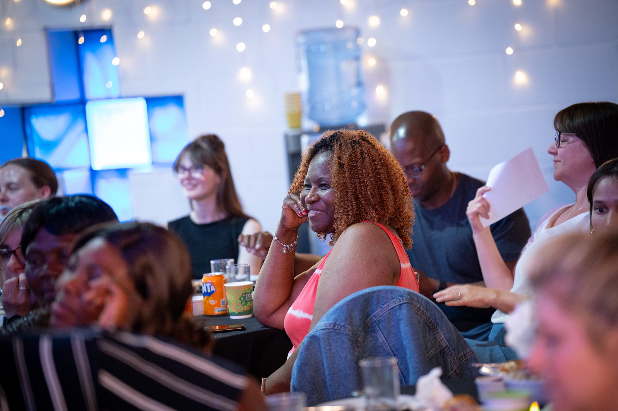 People gathered at a church community event in Bury St Edmunds, Suffolk, enjoying time together in a warm and welcoming setting.