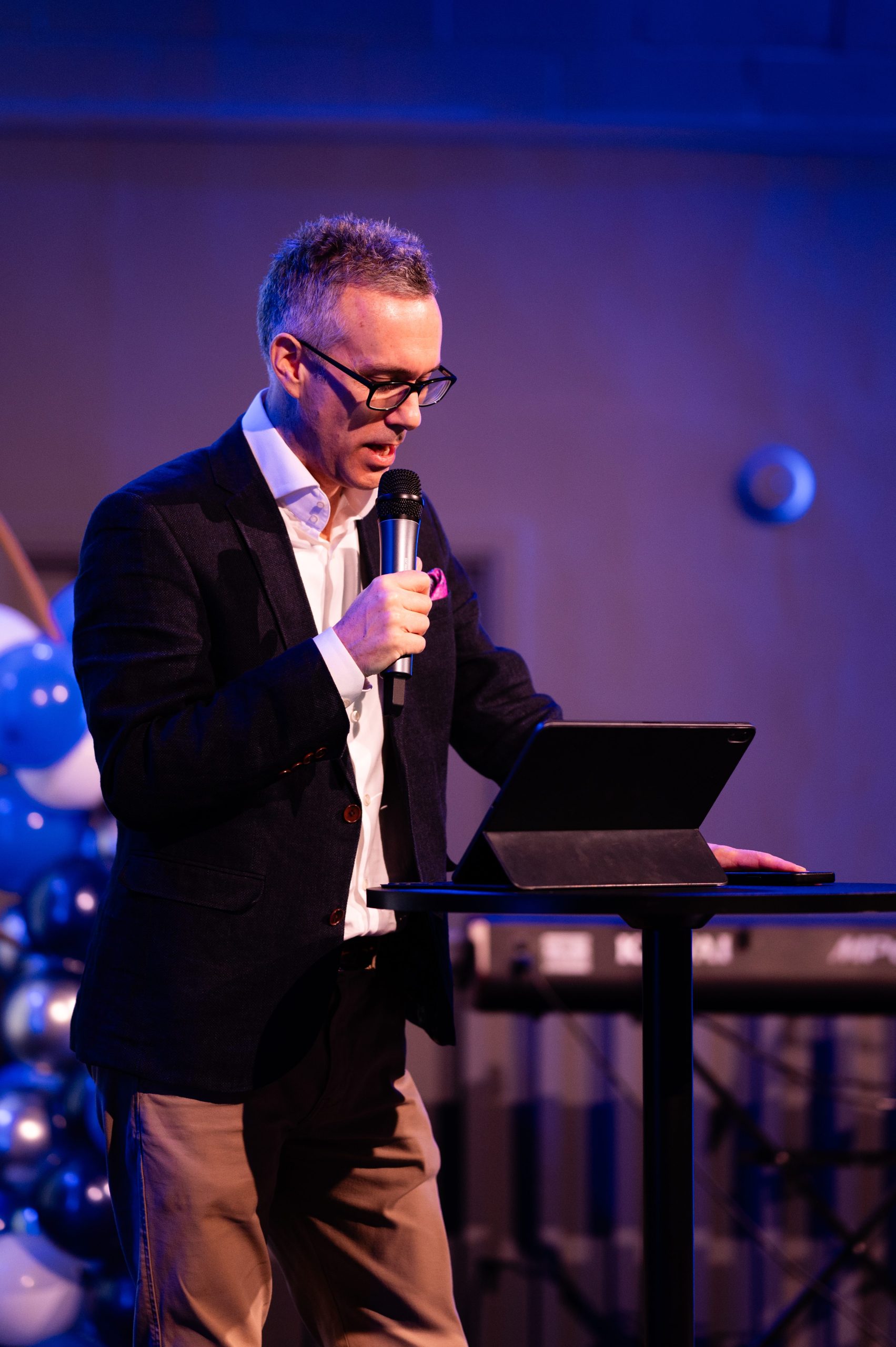 Speaker delivering a message at a church service in Bury St Edmunds, Suffolk.