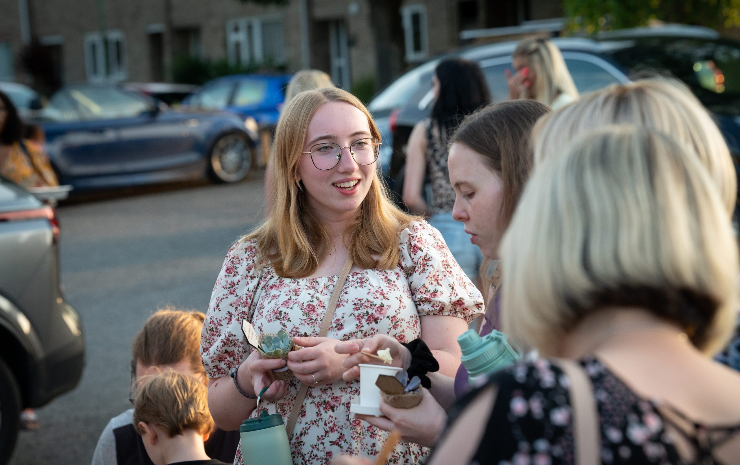 People chatting and connecting outside a church gathering in Bury St Edmunds, Suffolk”