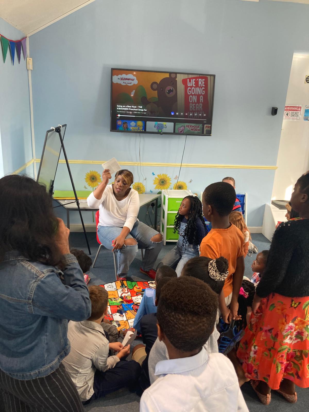 Children participating in a Bible lesson and group activity at Beacon Kidz, the children's ministry of Beacon Church in Bury St Edmunds, Suffolk, during a fun and engaging Sunday programme.